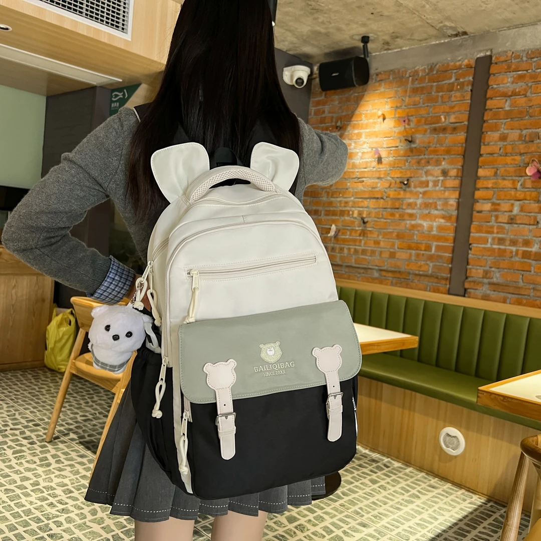 书包女初中生2025新款旅行背包高中学生女生大容量韩版撞色双肩包