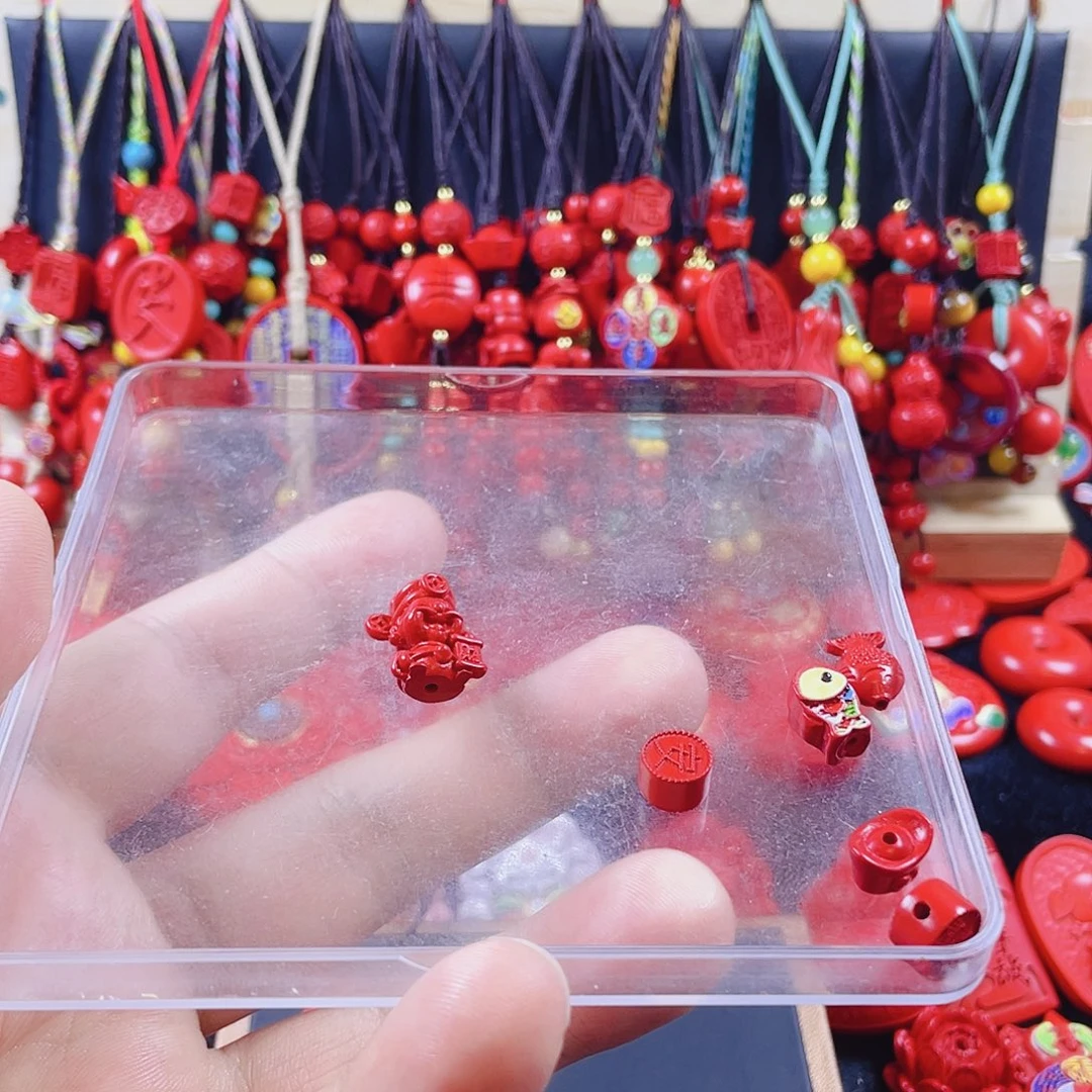 A***1天然辰砂含辰砂工艺品财爷爷手机坠