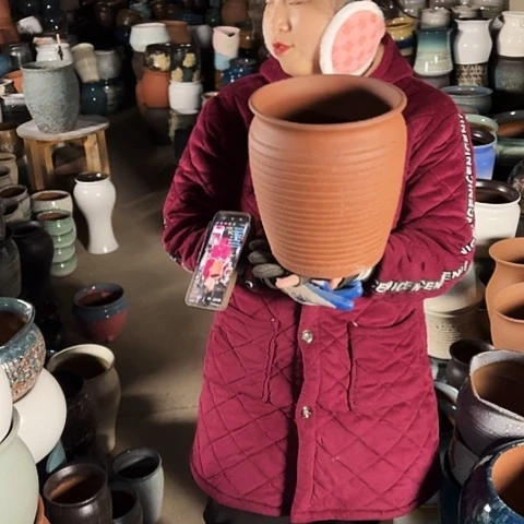口21高24瑕疵底裂盆子。