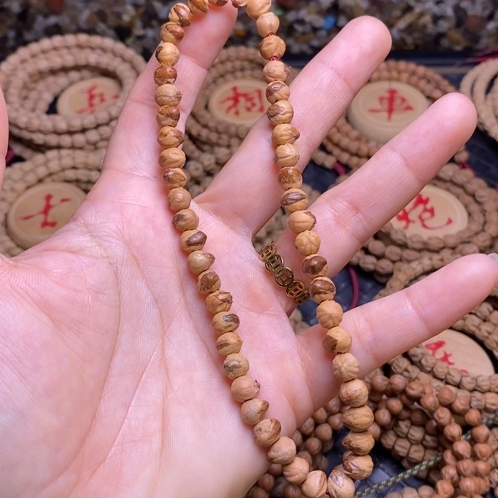 柏香籽/百香籽吊坠手持