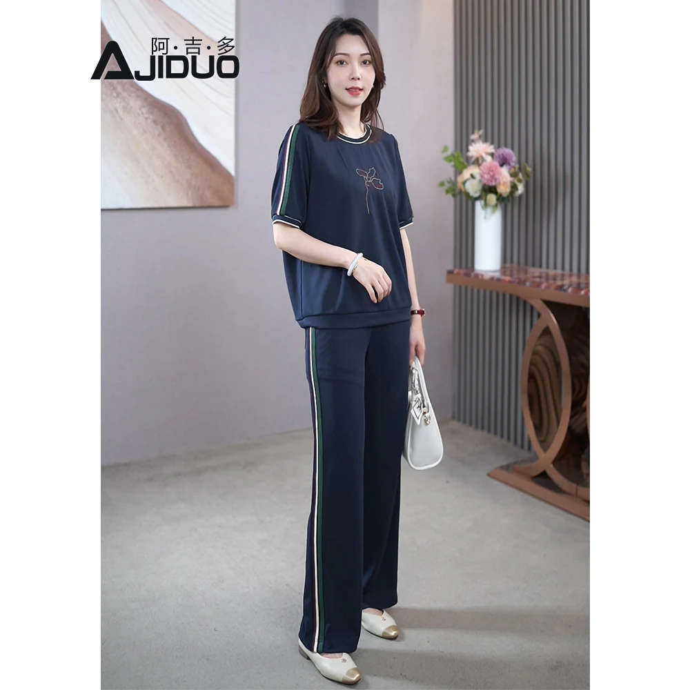 大码女装胖mm时髦套装新款休闲显瘦洋气减龄短袖上衣直筒裤两件套