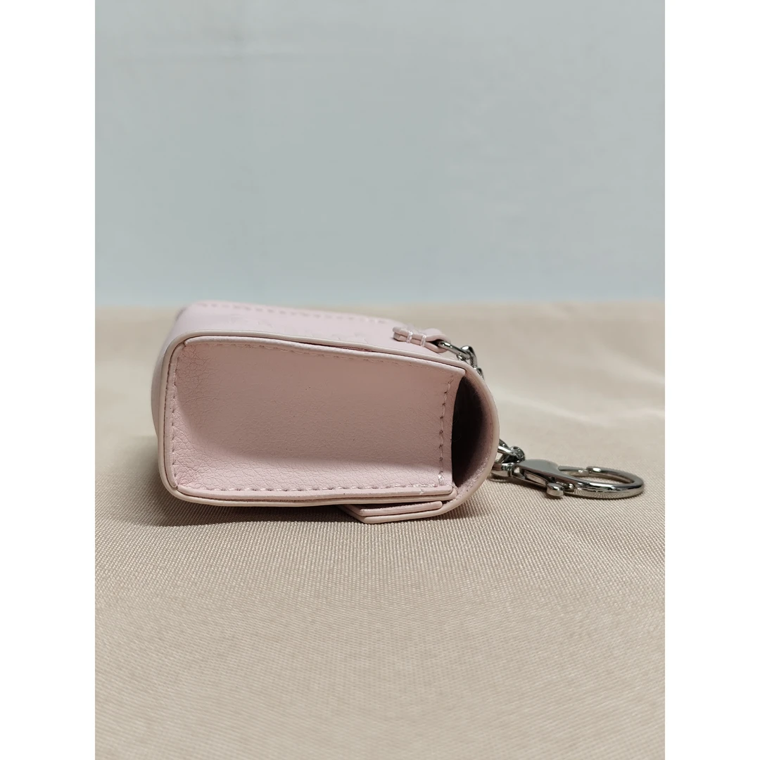 小纪啊~粉色耳机包化妆包推荐