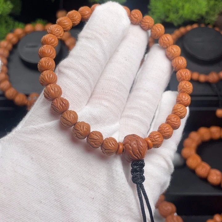 歪***冷木质类精品桃核手持