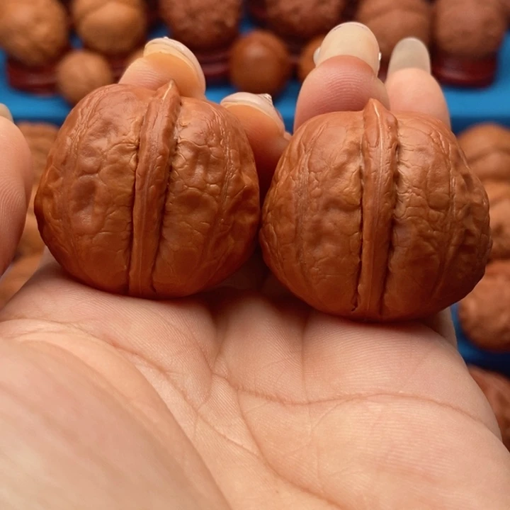 文玩核桃把件铁石