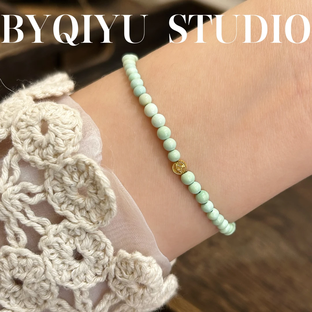 18K金绿松手串一条