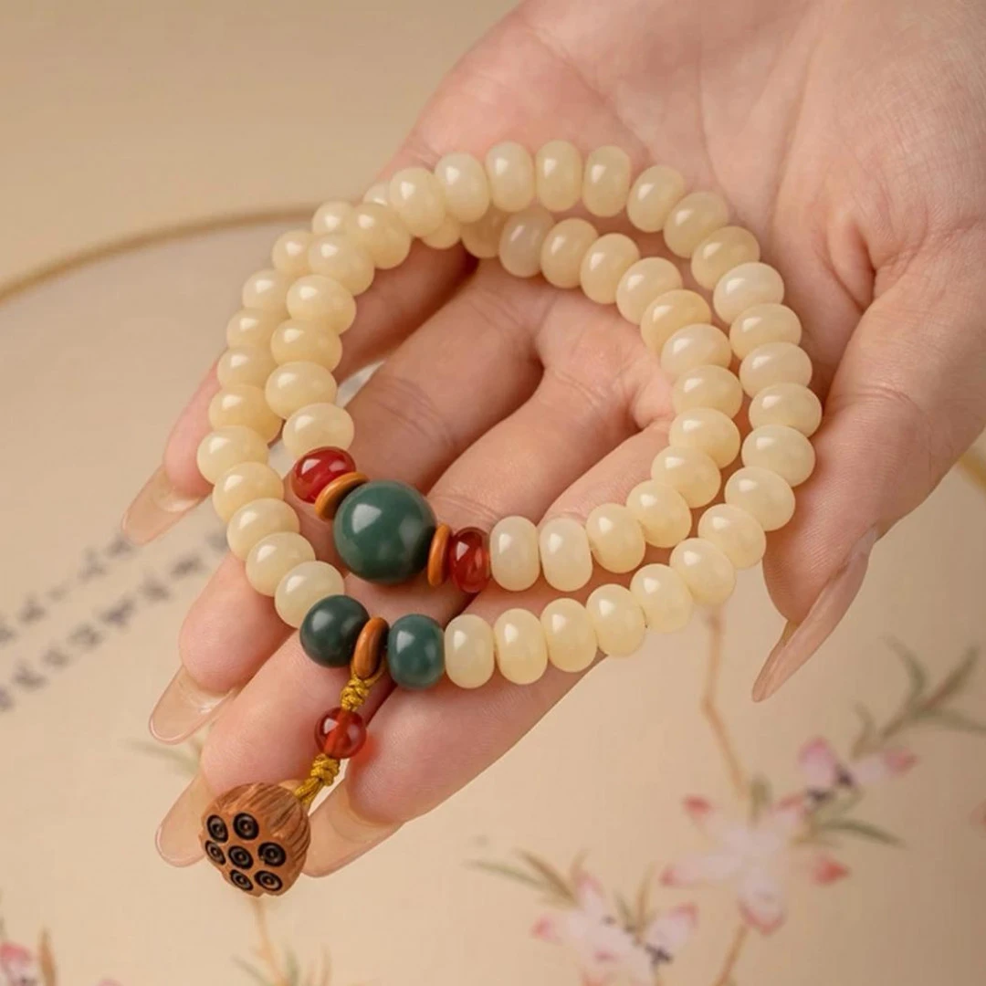 奶油黄算盘珠菩提根双圈手串手持款（盘玩袋）