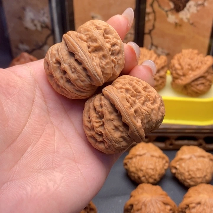 文玩核桃把件556平谷元宝42全品