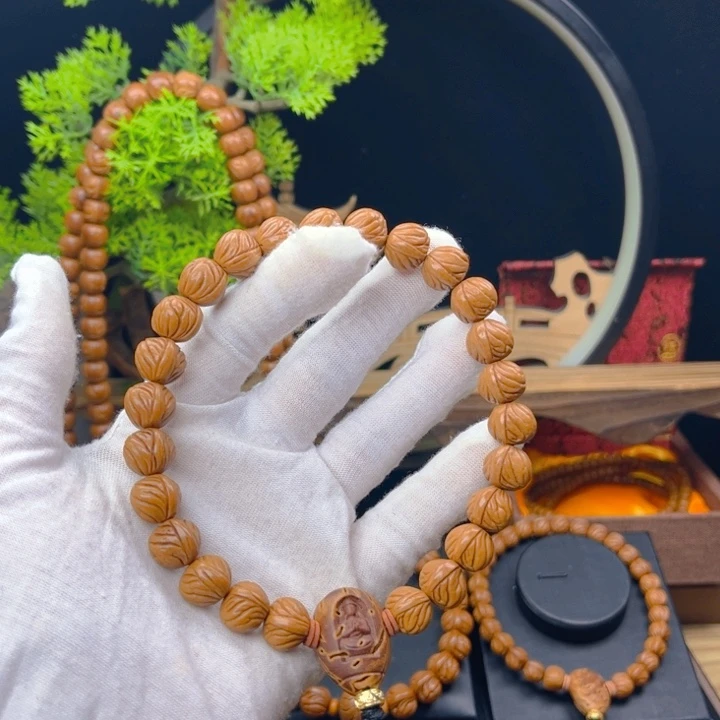 桃核吊坠盛**圃野生桃核小飞龙手持