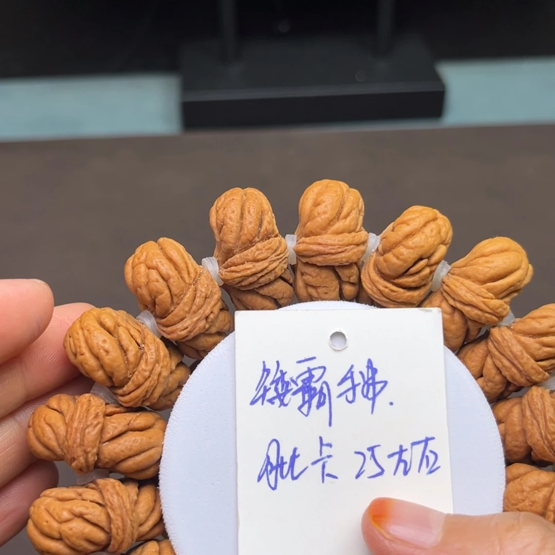 桃核吊坠矮霸王龙手串