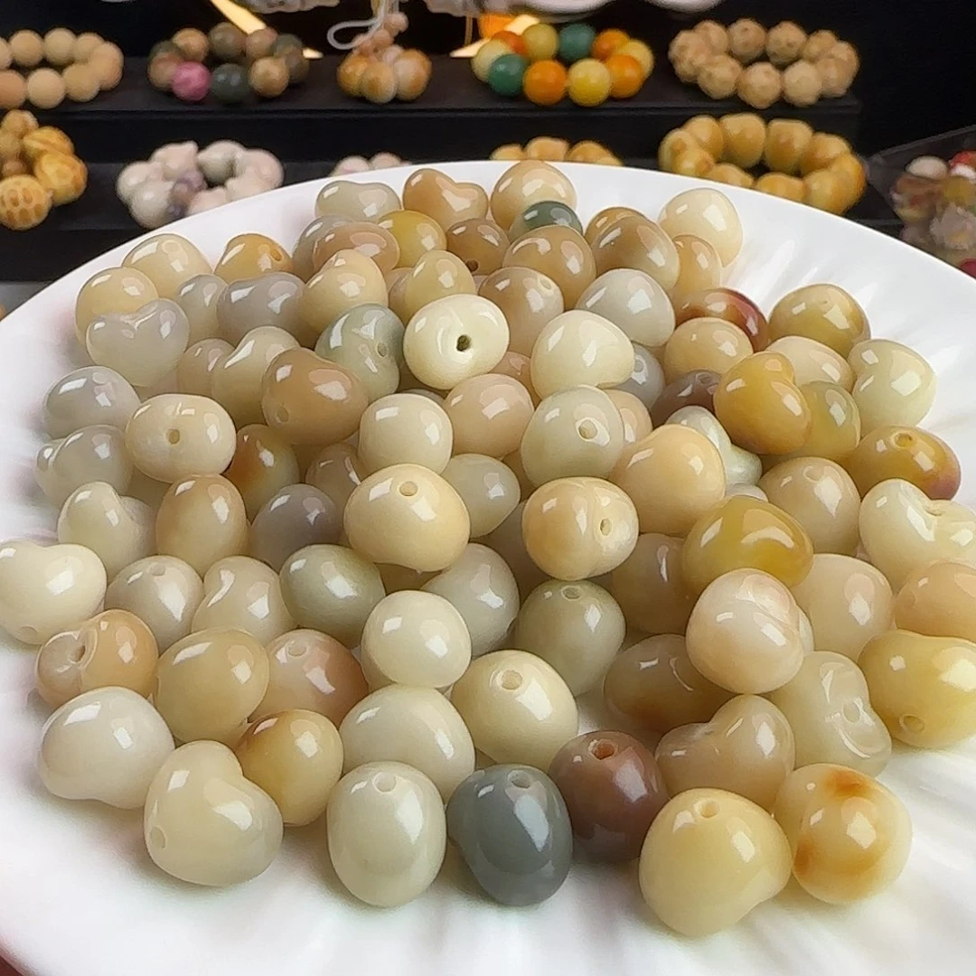 手串菩提根/象牙果卡13.5玉化爱心20颗