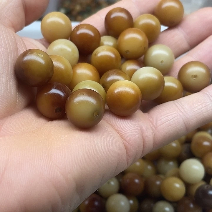 吊坠白玉菩提16瑕疵焦糖圆50颗
