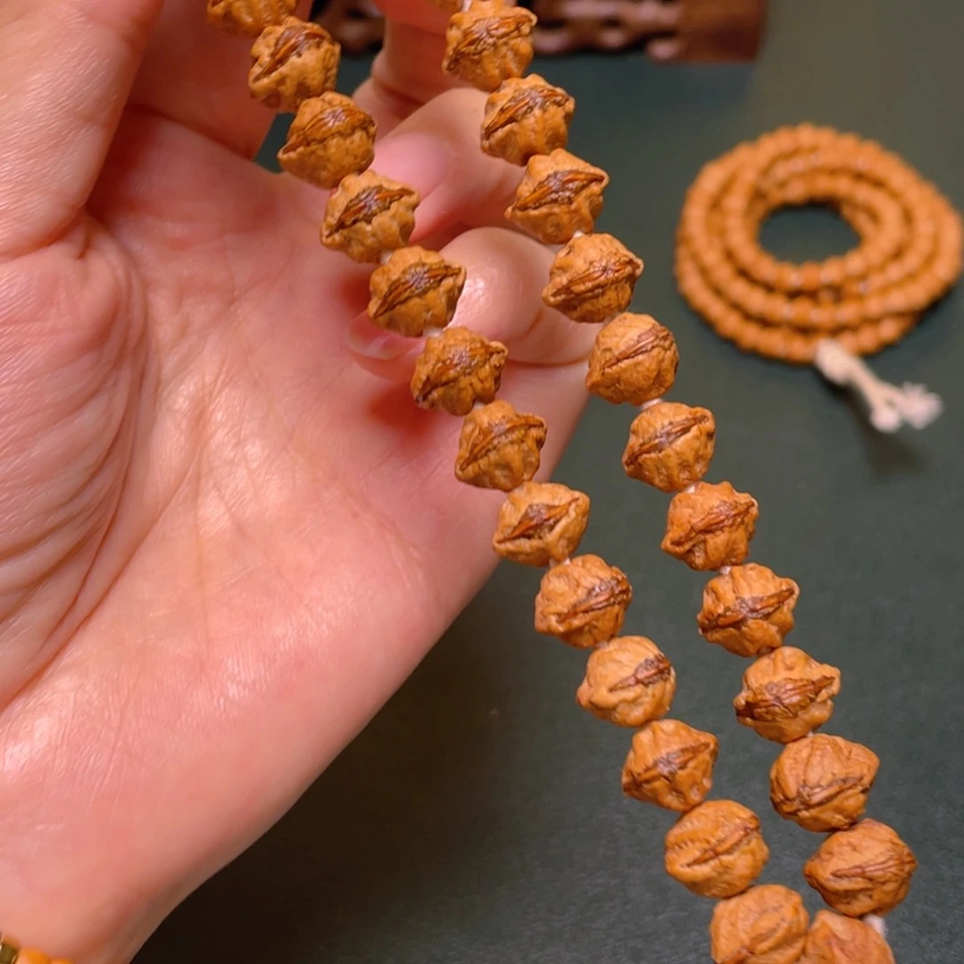 柏香籽/百香籽手串红牙龅牙口手持