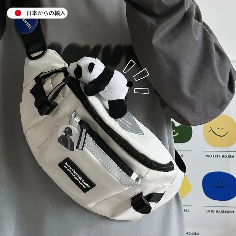 日本包包女2025新款胸包斜挎包男款腰包手机包饺子包运动帆布单肩