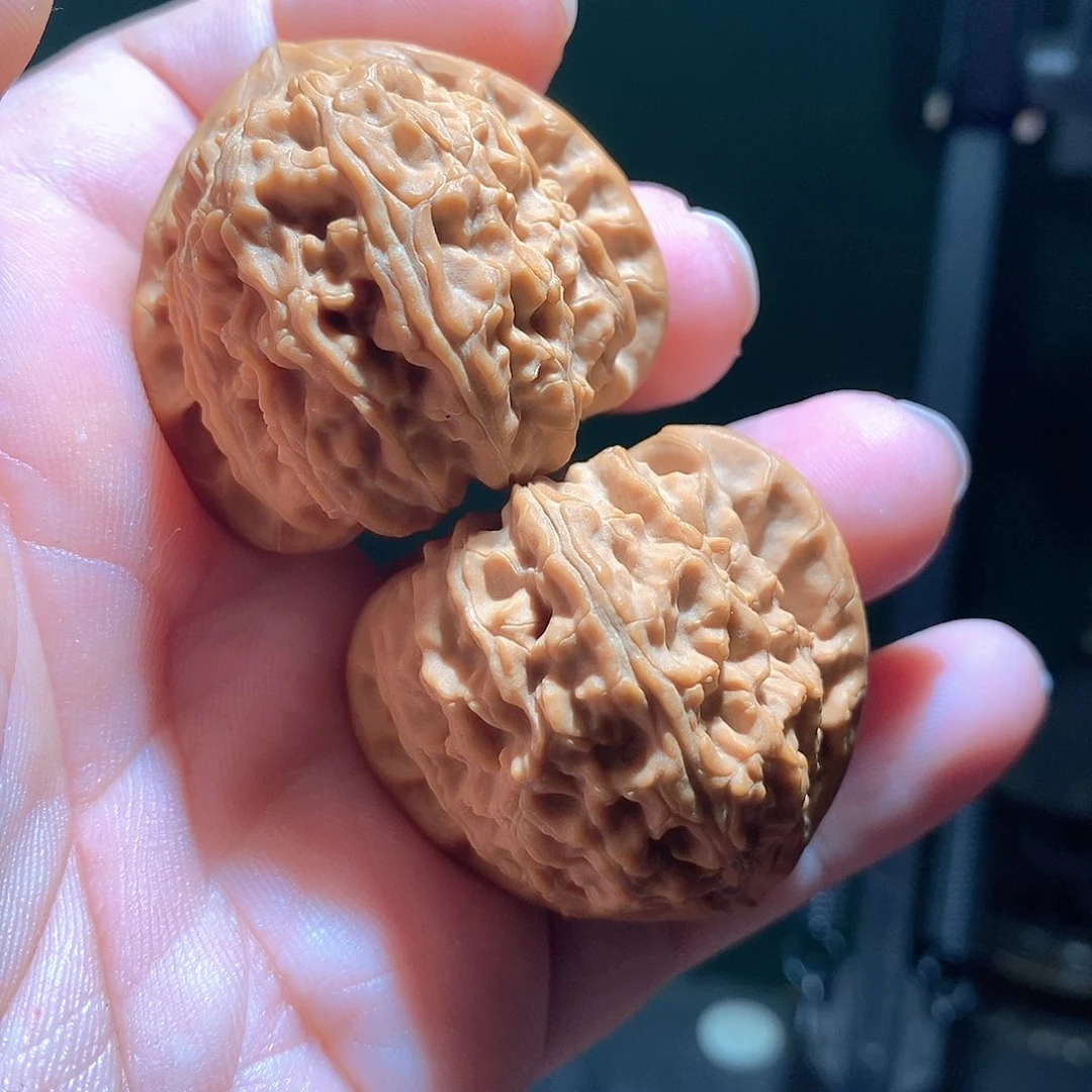 觉***罗把件文玩核桃40三角白