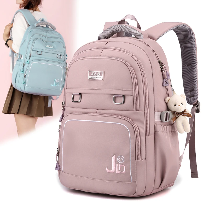 纯色防水初中生书包女减负中学生高中生双肩包大容量背包五六年级