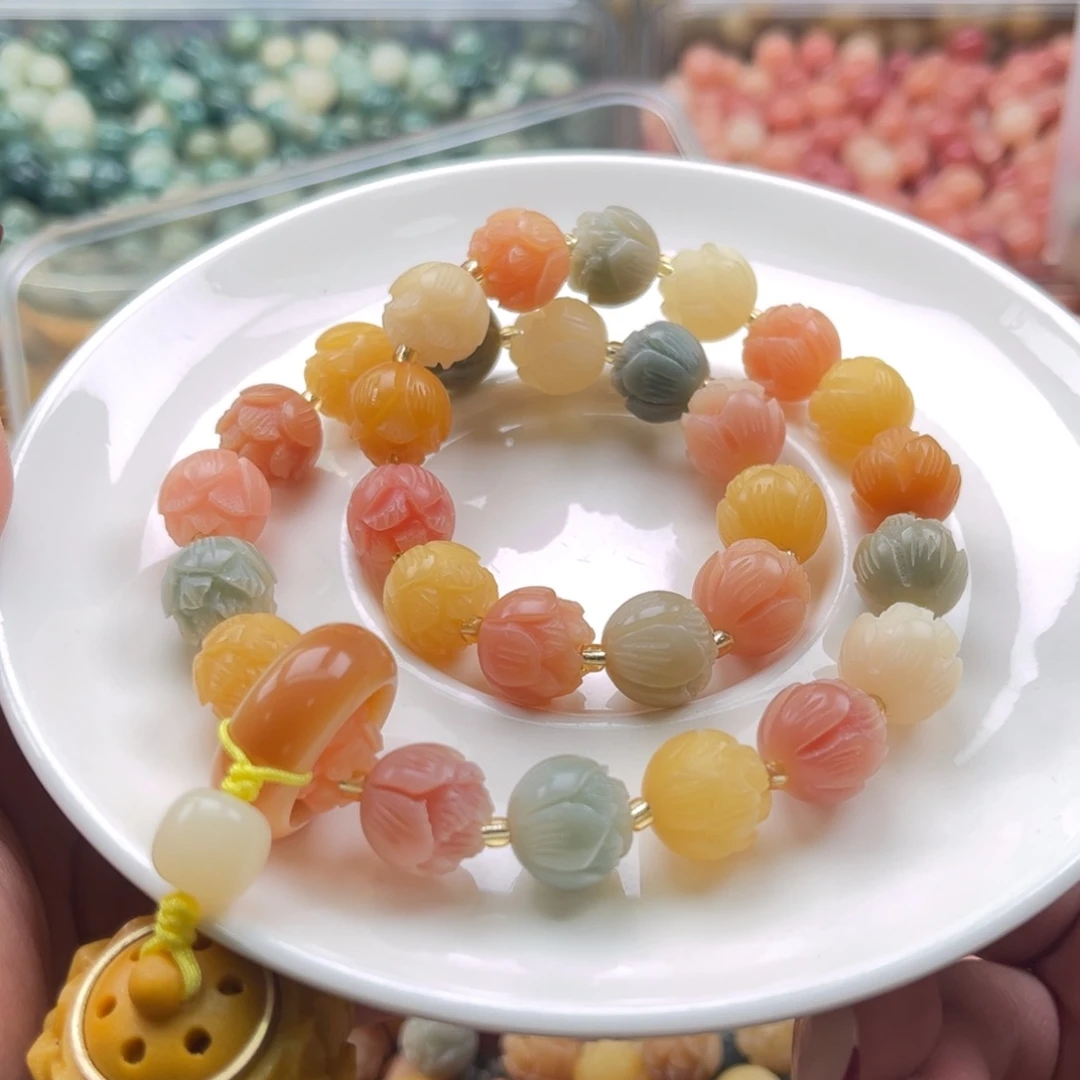 白玉菩提吊坠q12-13mm22颗。有钱花