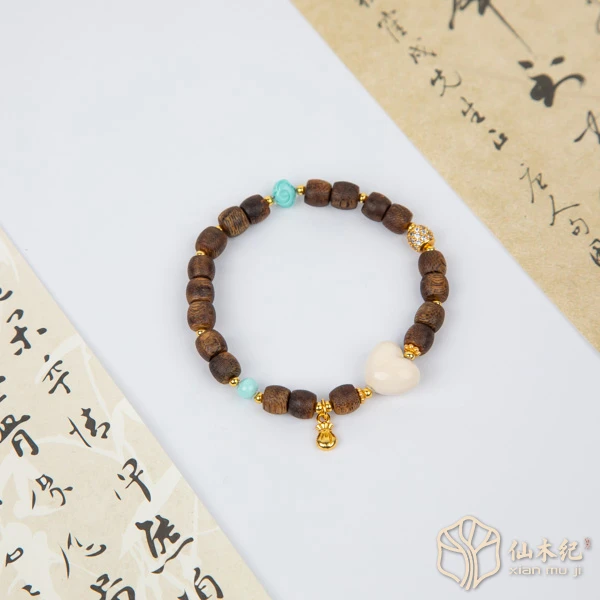 沉香【醉心】海南莺歌绿奇楠·猛犸爱心沉香手串（多样性发一）