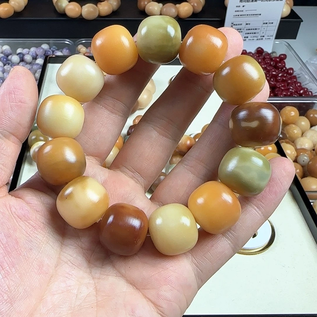 菩提根/象牙果手串工***队瑕疵卡19手串一条