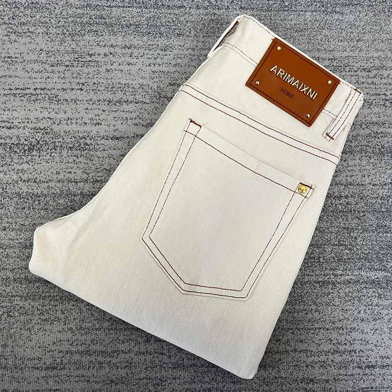 约文库费高端时尚春夏季男款牛仔裤简约高级感修身小脚显瘦款长裤