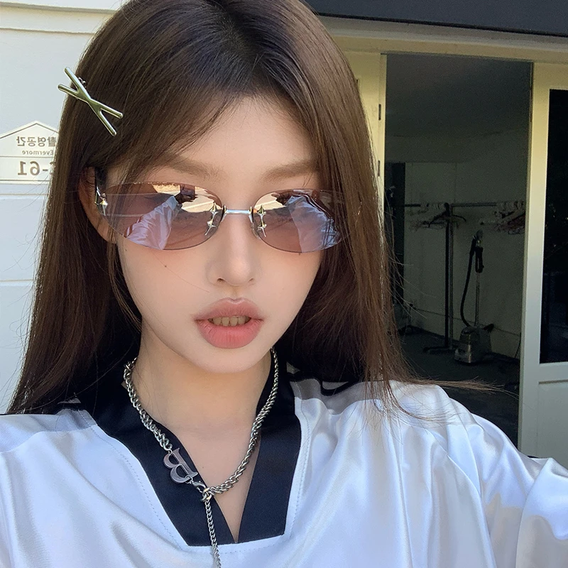 新款椭圆猫眼无框女士太阳镜欧美风高级感时尚防晒墨镜