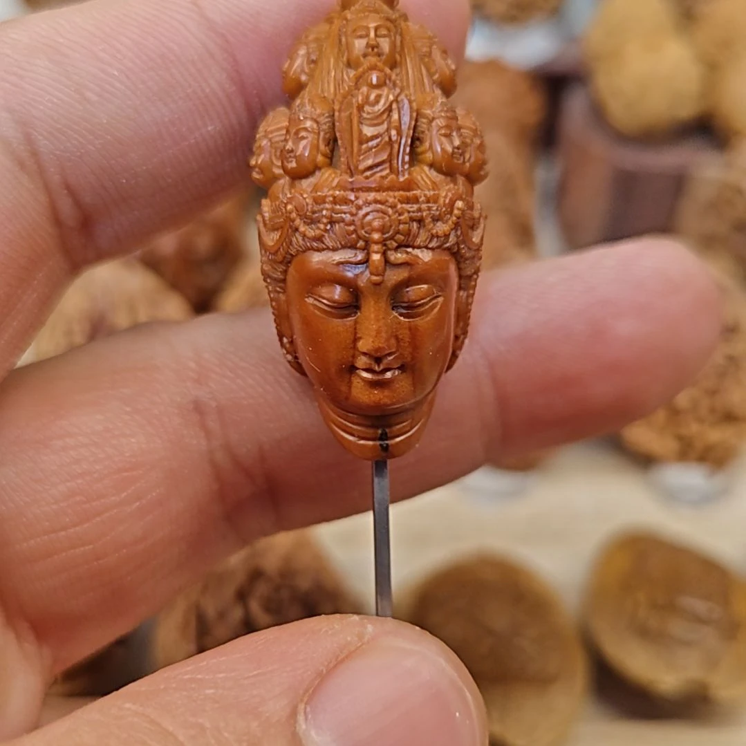 橄榄核吊坠纯手工雕刻十面佛