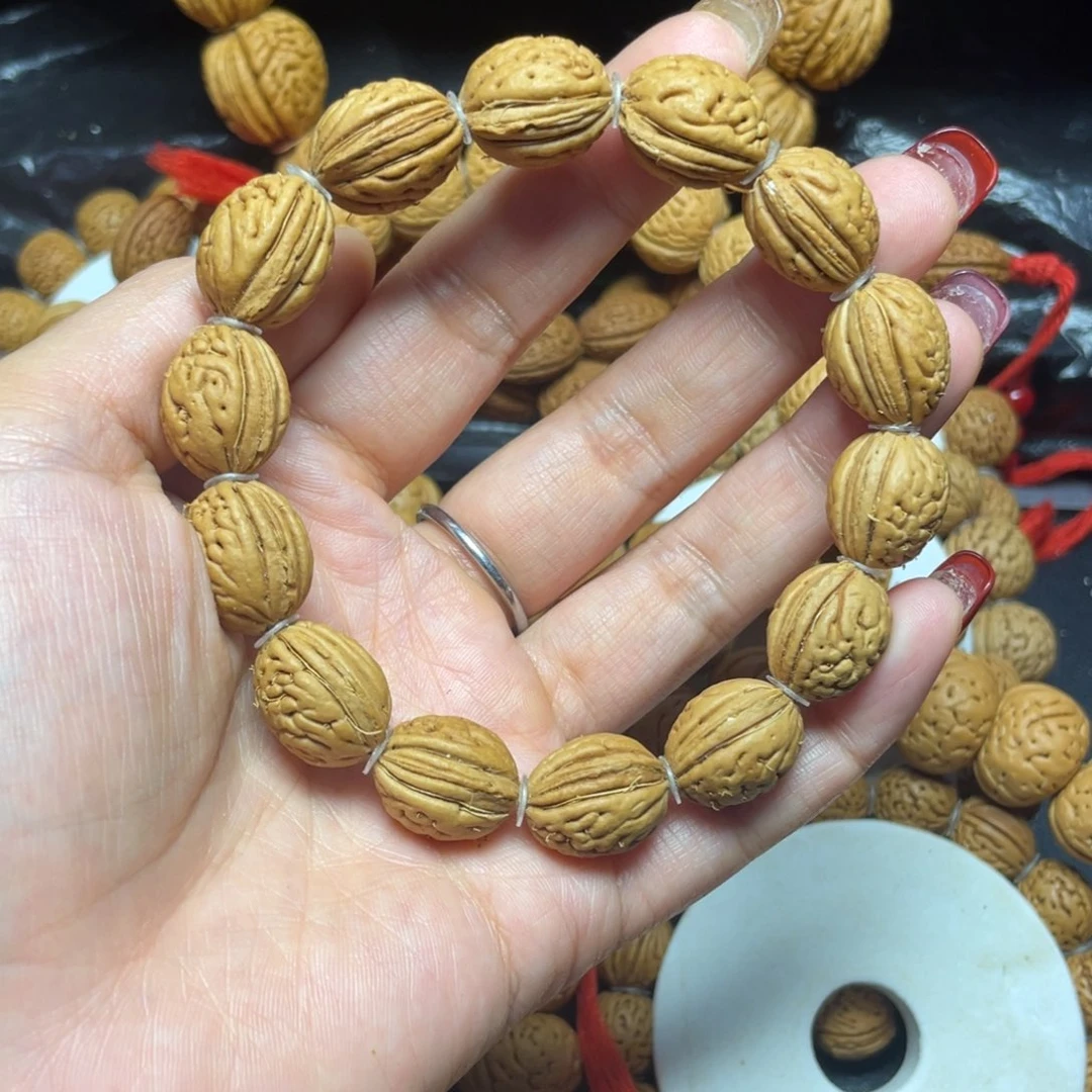 桃木桃核手串13+野生钱袋子