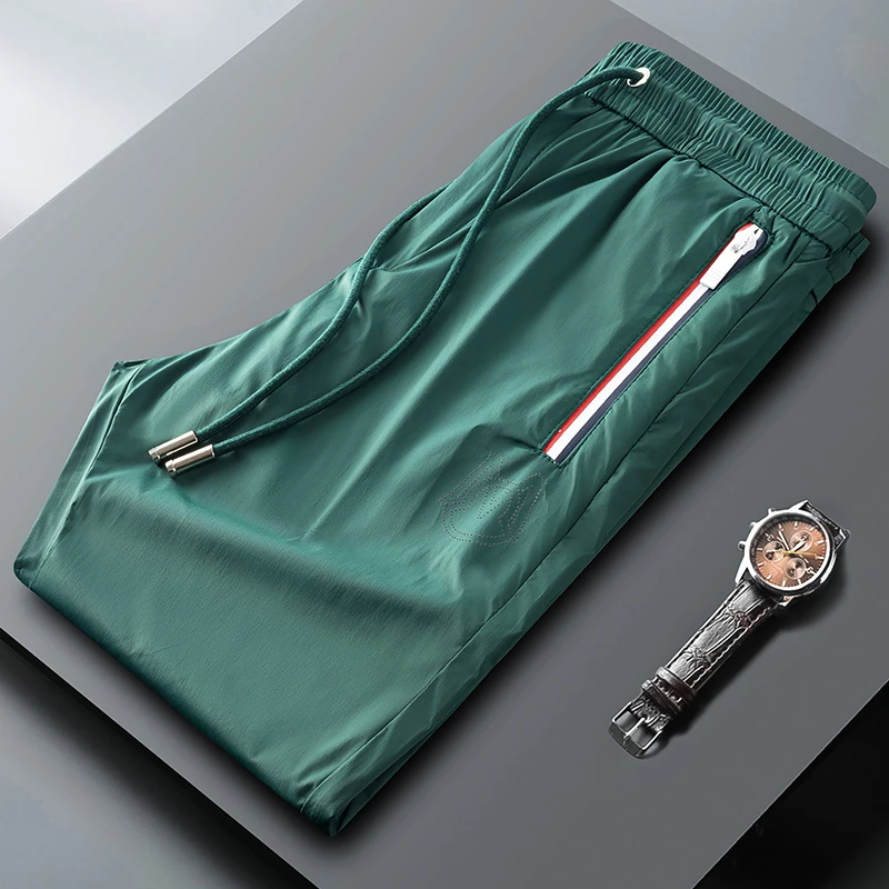 轻奢夏季顺滑冰丝速干运动裤男收口修身小脚口袋拉链休闲卫裤男士