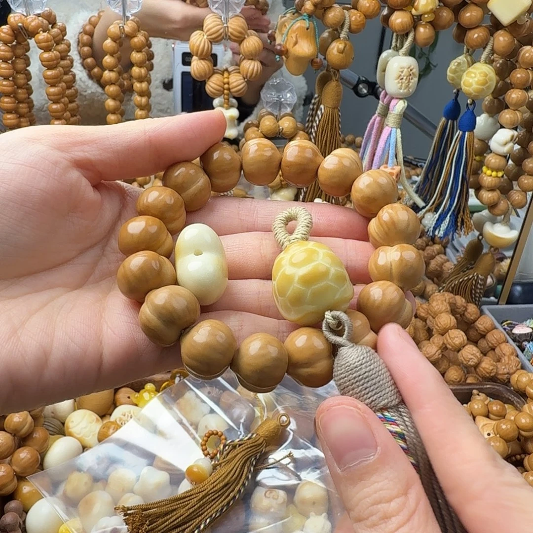 璇***锦菩提籽类猴头手串