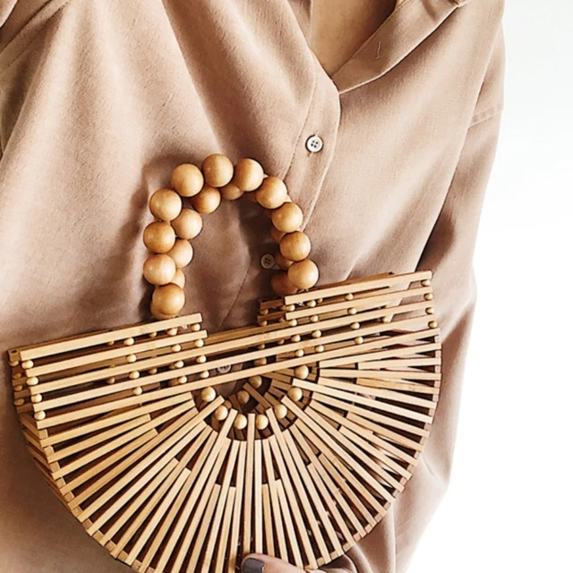 新款木珠手提编织包半圆形镂空竹编包户外手拿沙滩包多款藤编包