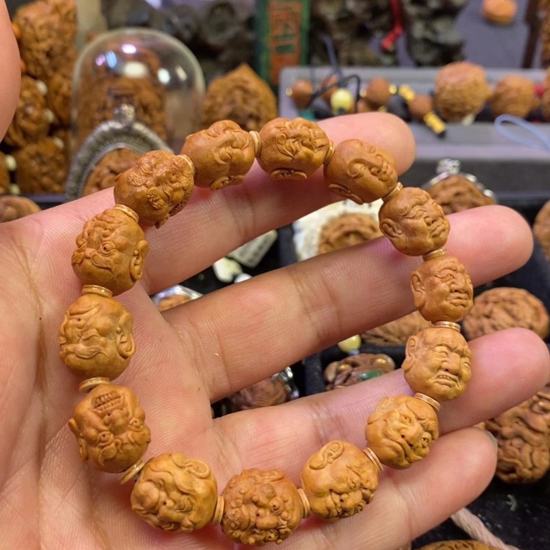 罗汉头手串潍坊核雕桃核雕刻