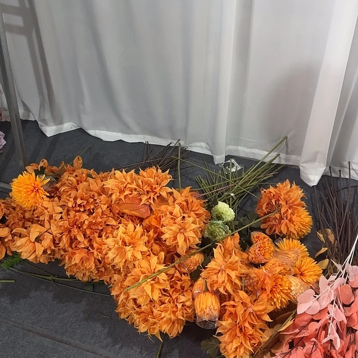 100支橘色系特价款仿真花