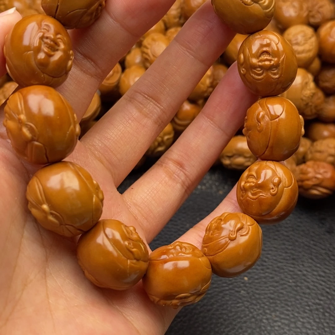 手串橄榄核浮雕财迷
