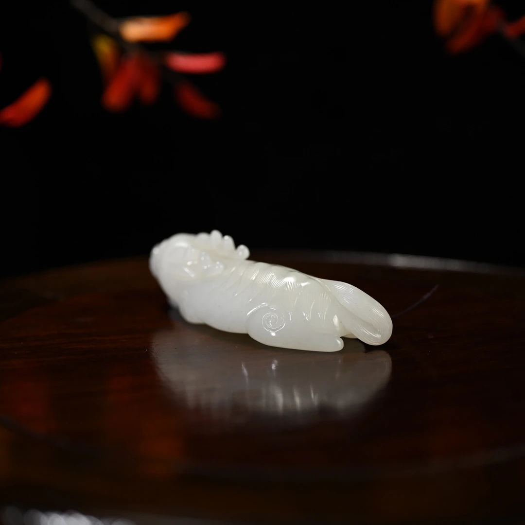 LOT8860 2511250133和田玉白玉麒麟手把件/保利