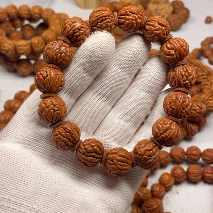 3号链接桃核手串一个