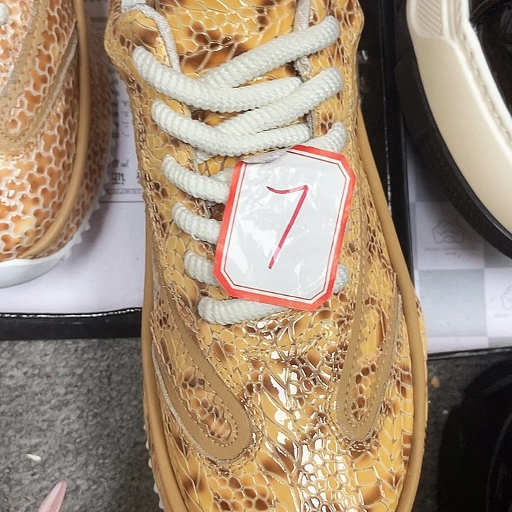真皮望****肉皮包底金黄41