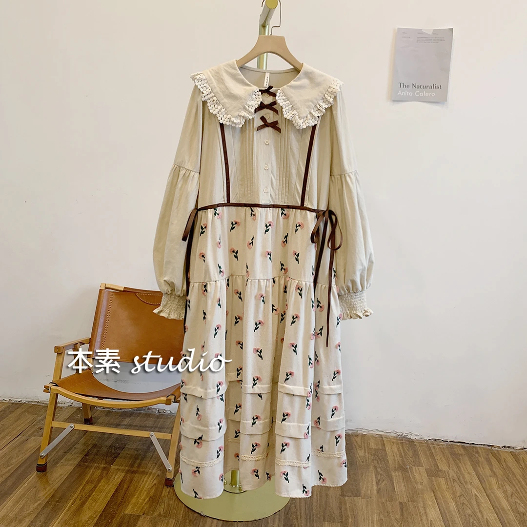 欢颜C3405剪花风琴褶蝴蝶结半开扣腰侧系带娃娃领连衣裙