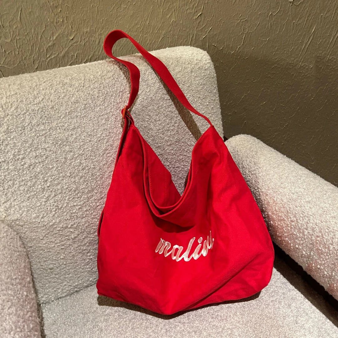 2025新款韩系红色帆布包包女可调节肩带轻便斜挎包休闲百搭托特包