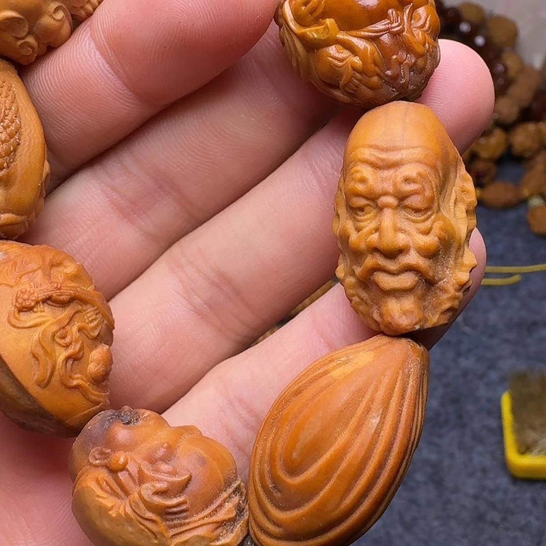 橄榄核手串退还给