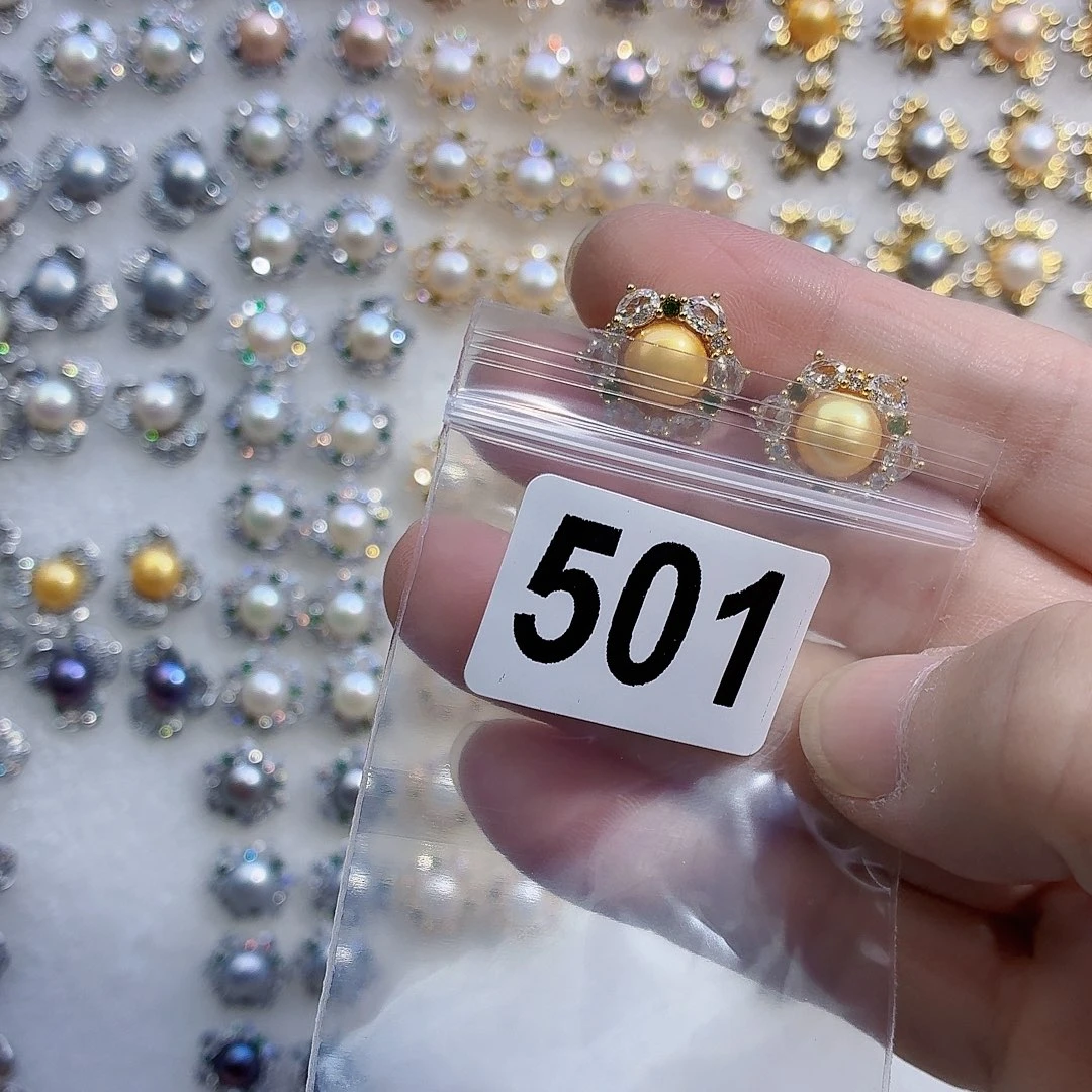 薰***…淡水珍珠合金耳饰