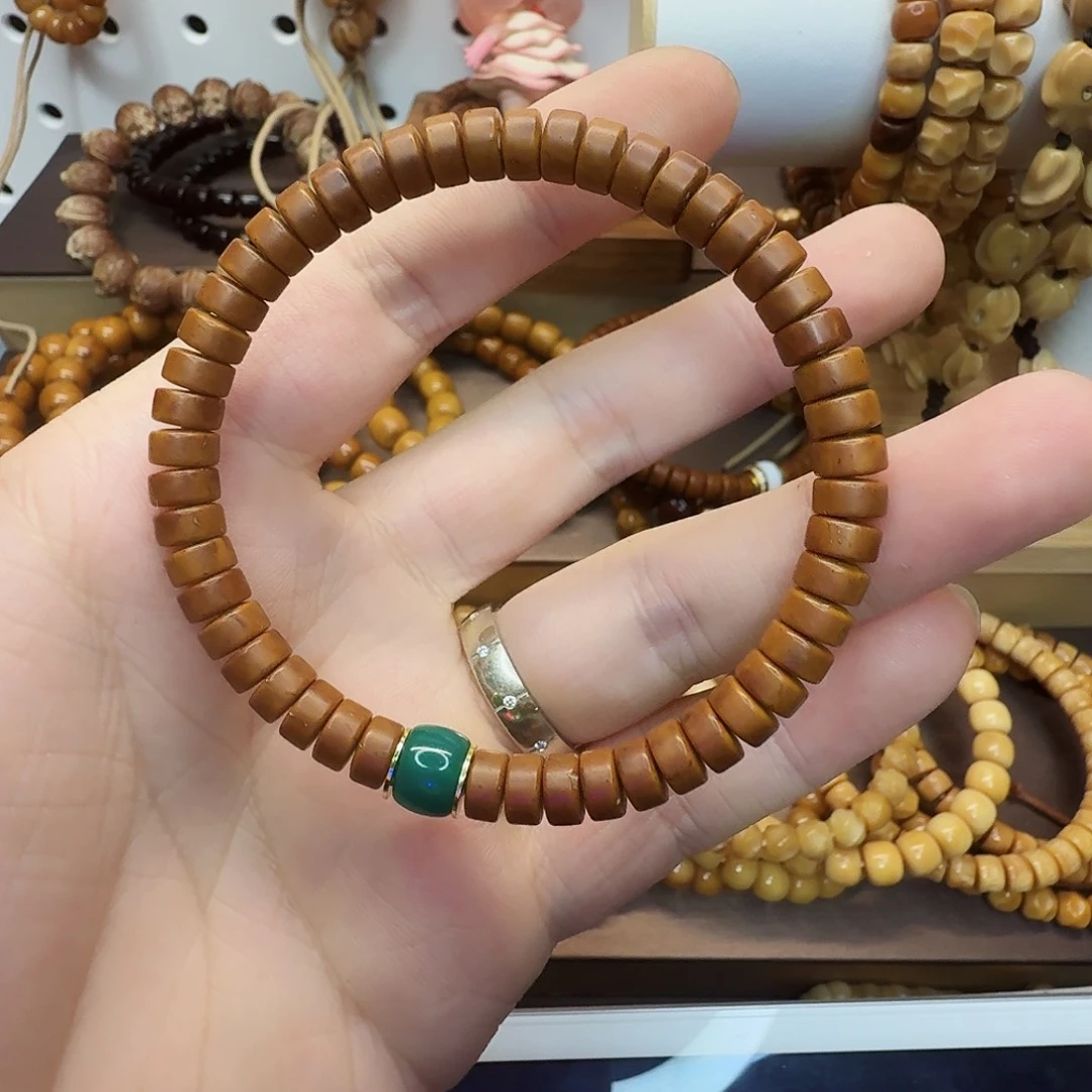 菩提根/象牙果吊坠小*七6.6*4纯肉鼠片