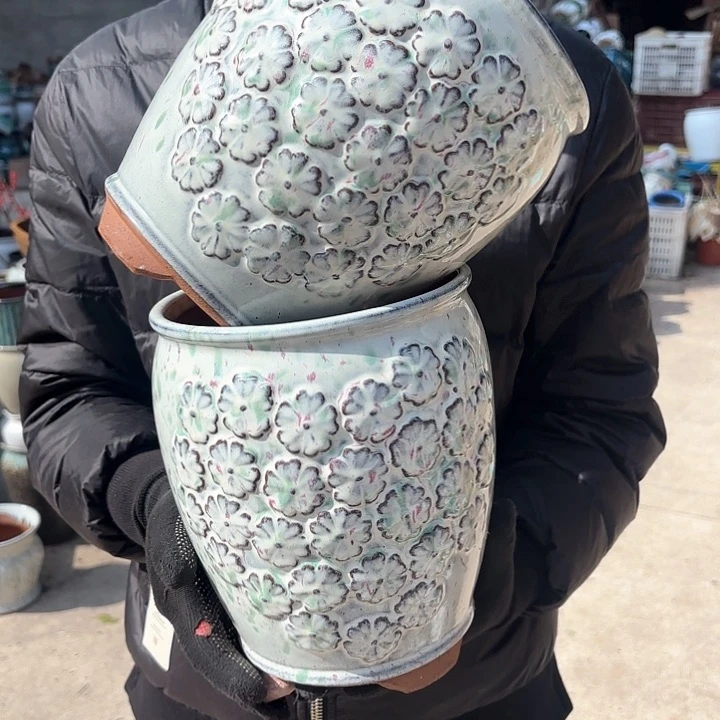 红陶口不圆两个口径18高度23