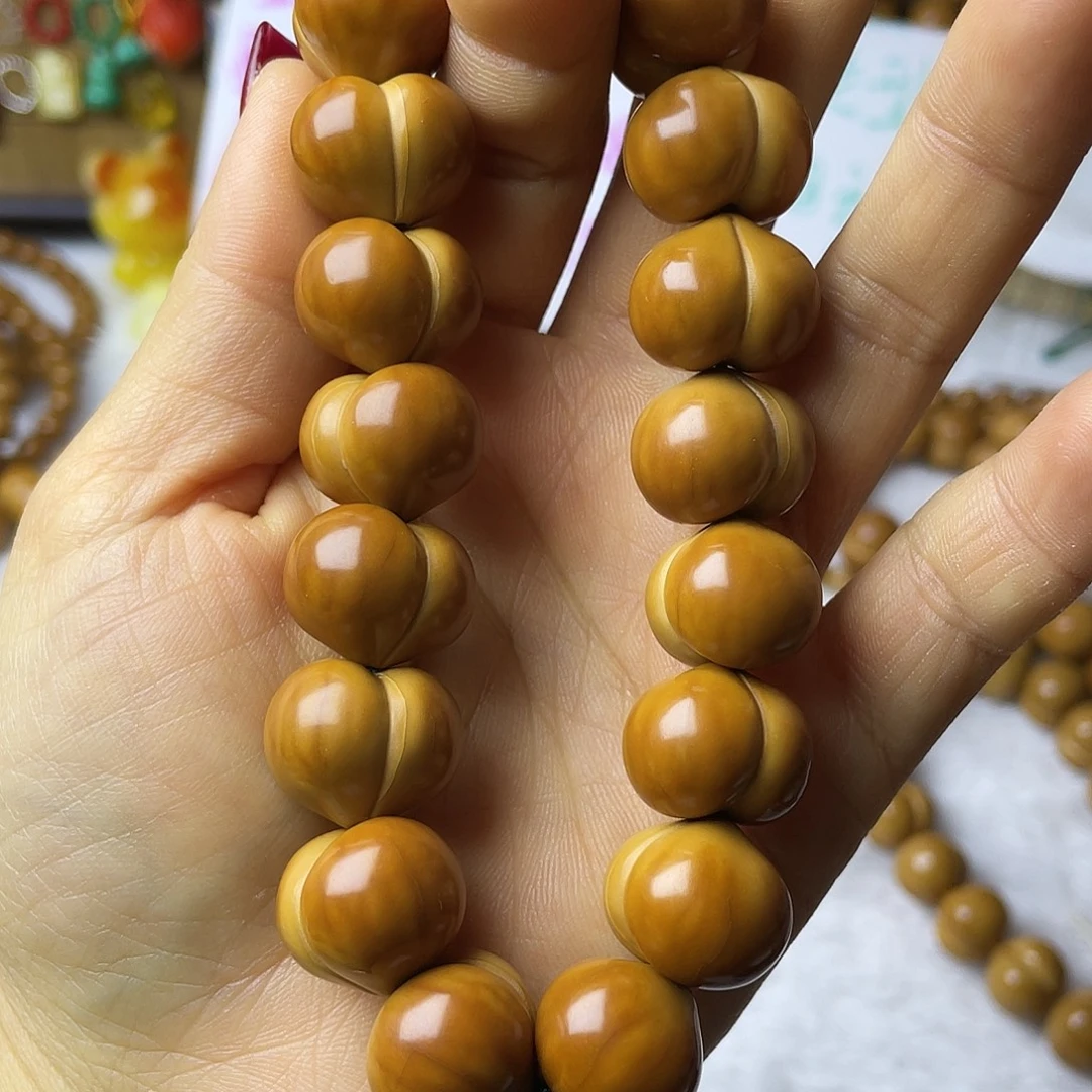 吊坠猴头核桃微瑕屁桃手串