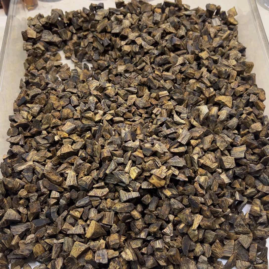 豆***豆沉香碎屑沉香海南红金倪米粒100克
