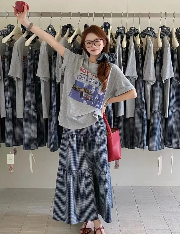 蓝色格子半身裙女夏2025新款蓬蓬蛋糕裙高腰垂感休闲a字中长裙子