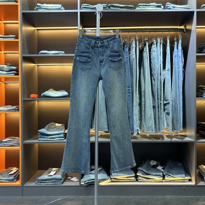 蓝色2025春季新款牛仔裤女装弹力窄版小众设计修身包臀喇叭裤长裤