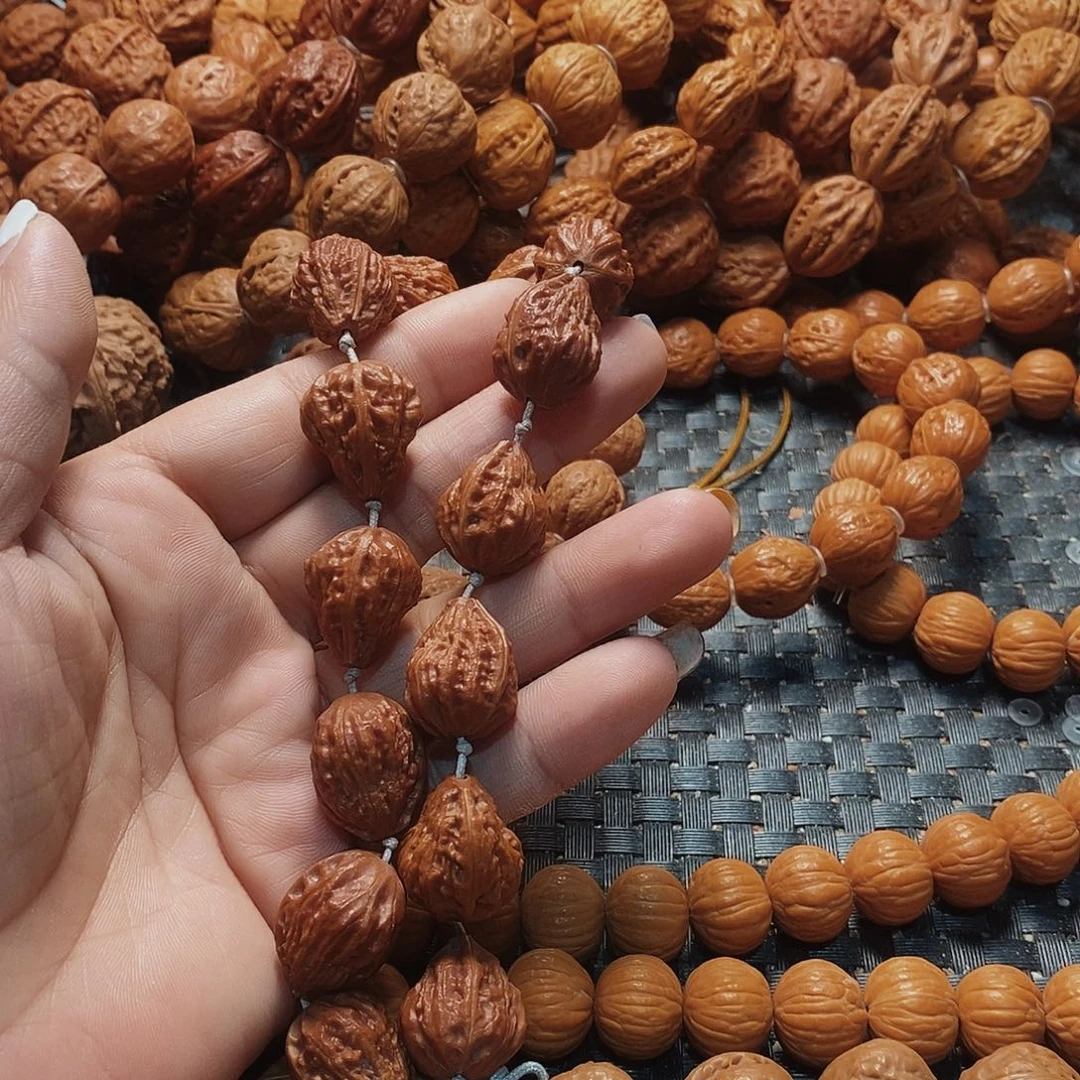 古***雪文玩核桃手串钱袋子