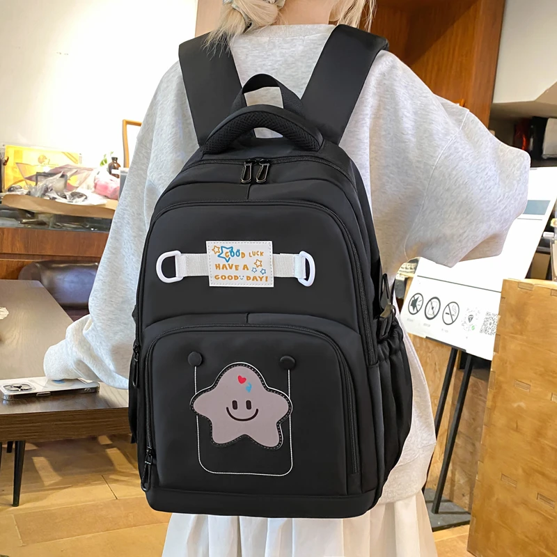 拼色星星书包初高中大学生男女减负卡通时尚休闲轻便潮流双肩背包