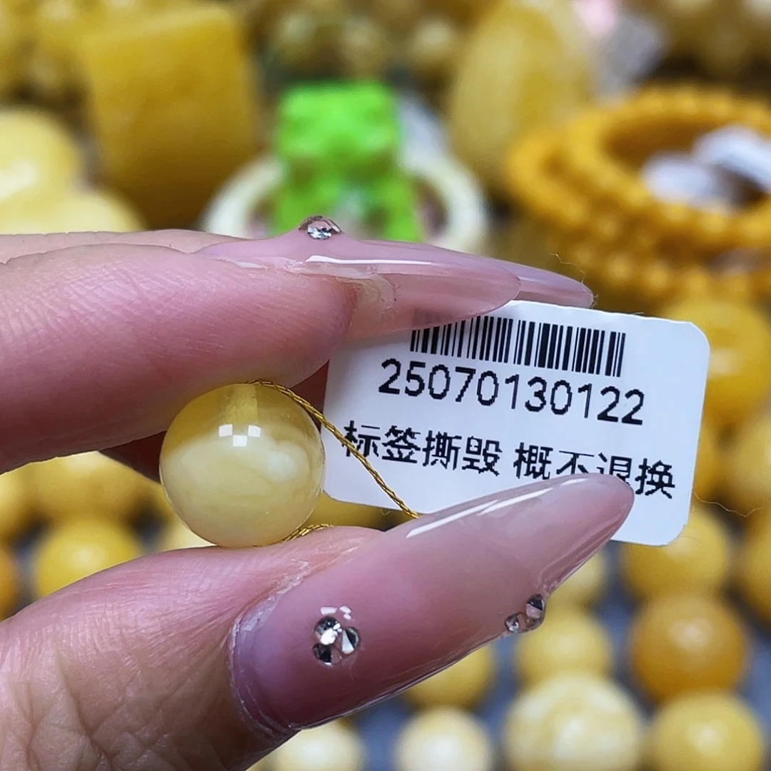 锦****蜜蜡未镶嵌裸石10.4mm