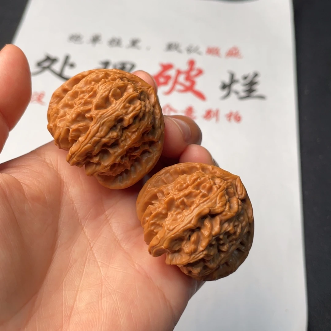 把件文玩核桃690。42三角白返油