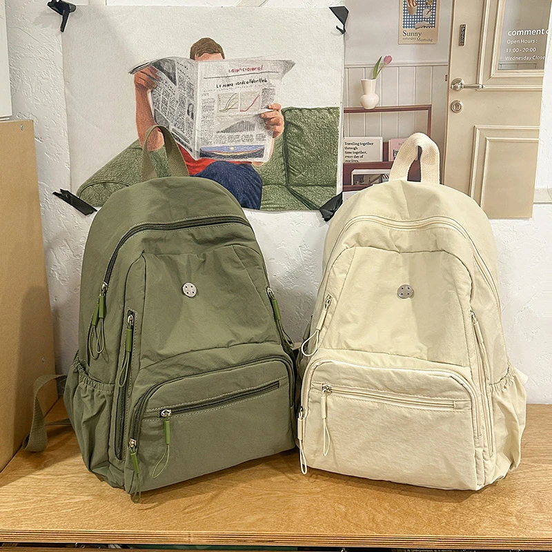 日系双肩包女2025新款时尚简约大容量电脑旅行包休闲男大学生背包